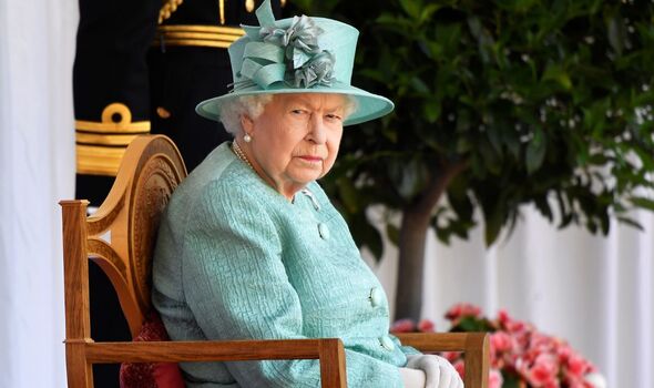 Queen Elizabeth pictured sitting