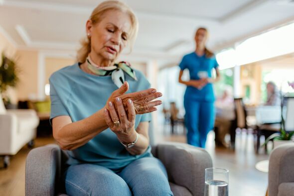 Woman suffering pain in hands