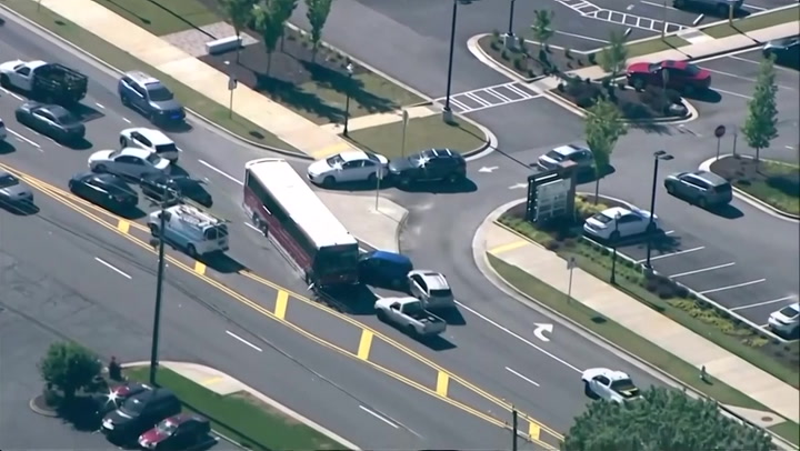 One dead as gunman hijacks bus and leads police on car chase through Atlanta suburbs