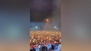 Flames engulf ferris wheel at German festival as rapper performs