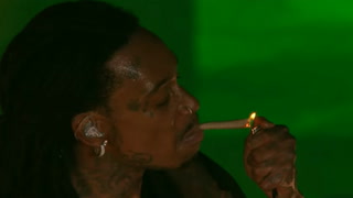 Watch: Wiz Khalifa lights joint on stage hours before being arrested 