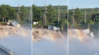 Minnesota building collapses into rushing floodwaters