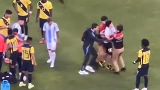 Pitch invader dragged away from Lionel Messi during Argentina friendly