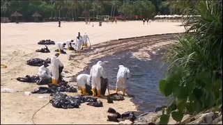 Oil spill blackens parts of Singapore coastline