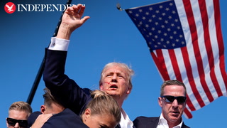 Moment Trump shot at rally before raising defiant fist in air