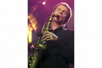 Saxophone player David Sanborn performs during his concert at the Stravinski hall at the "Colours of Music night" during the 34th Montreux Jazz Festival in Montreux, Switzerland on July 10, 2000. (Laurent Gillieron/Keystone via AP, File)