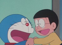 This supplied photo shows the character Nobita Nobi, right, voiced by Noriko Ohara, in a scene from the TV anime series "Doraemon." (Copyright Fujiko Pro, Shogakukan, TV Asahi, Shin-ei, ADK) (Kyodo)