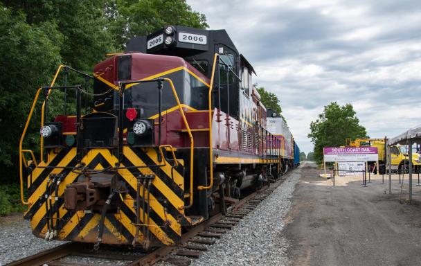 Locomotive on the tracks at South Coast Rail groundbreaking in Freetown