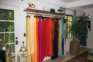 Rack of colorful dresses at Tab Vintage.