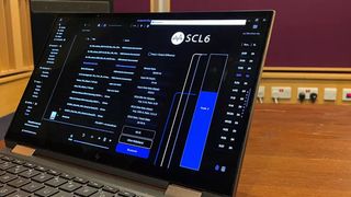 A laptop displaying an SCL6 demo