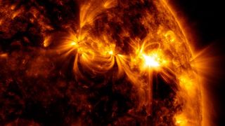 This colorized image captured by NASA's Solar Dynamics Observatory space telescope shows a powerful solar flare blasting from the sun on March 31, 2022. 