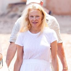 Pamela Anderson wearing a white T-shirt
