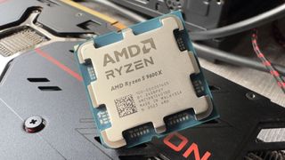 A close-up photo of an AMD Ryzen 5 9600X CPU