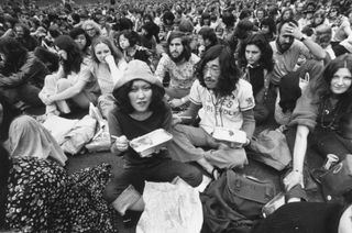 A group of hippies attending a rock festival in 1972