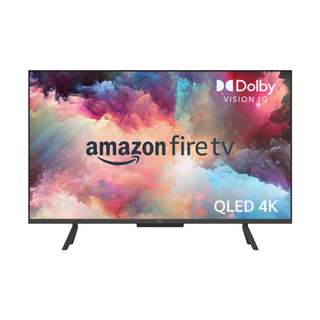 Amazon Fire TV Omni QLED on a white background with colourful smoke on the screen
