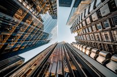 looking up at skyscrapers in London's financial district