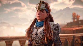 Aloy smiling in the PS5 game Horizon Forbidden West.