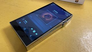 Astell & Kern A&ultima SP3000 music player on a desktop