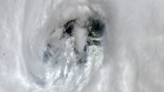 Astronaut Bob Hines captured this image of Hurricane Ian's massive eye on Sept. 28 while aboard the International Space Station.