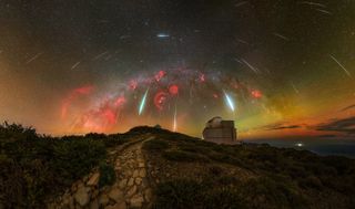 Geminid meteor shower against colorful sky full of stars.