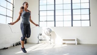 Woman jumping the best jump ropes in gym 