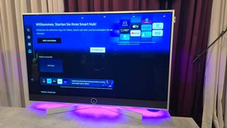 Loewe Stellar TV with the Tizen home menu on screen