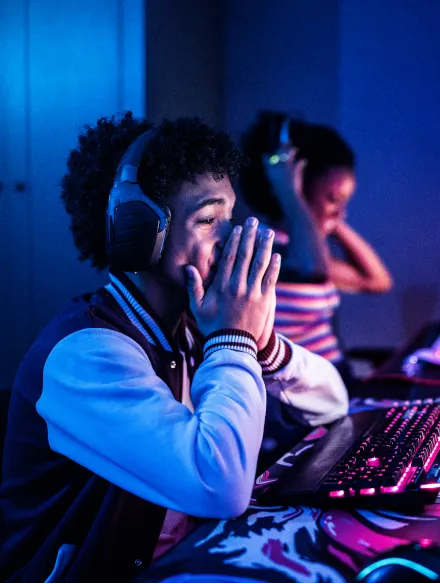 Two Teenagers playing computer games.