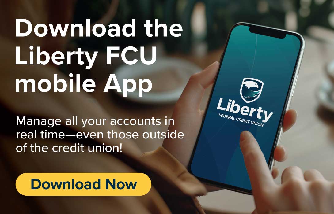 A person holding a cell phone with the Liberty Fcu app on it.