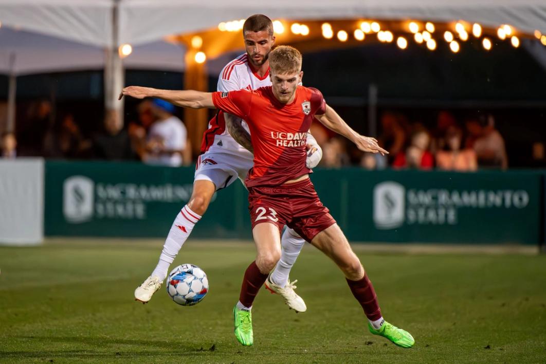 Kieran Phillips battles for the ball during a Sacramento Republic match