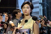 Former Wall Street Journal reporter and chair of the Hong Kong Journalists Association Selina Cheng (R) addresses a press conference in Hong Kong on July 17, 2024. A former Wall Street Journal reporter in Hong Kong on July 17, accused the paper of firing her over her role leading a press union and advocating for press freedom in the Chinese city.