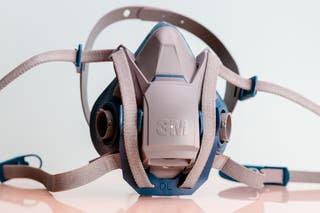 The front of the 3M 6502QL/49489 half facepiece respirator.