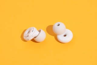 Our pick for best earplugs if you want adjustable noise reduction, the Loop Switch Earplugs, in white.