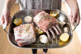 The williams sonoma all-clad flared roaster ready to cook lamb.