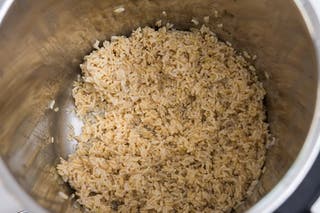 Brown rice cooked in a pressure cooker.