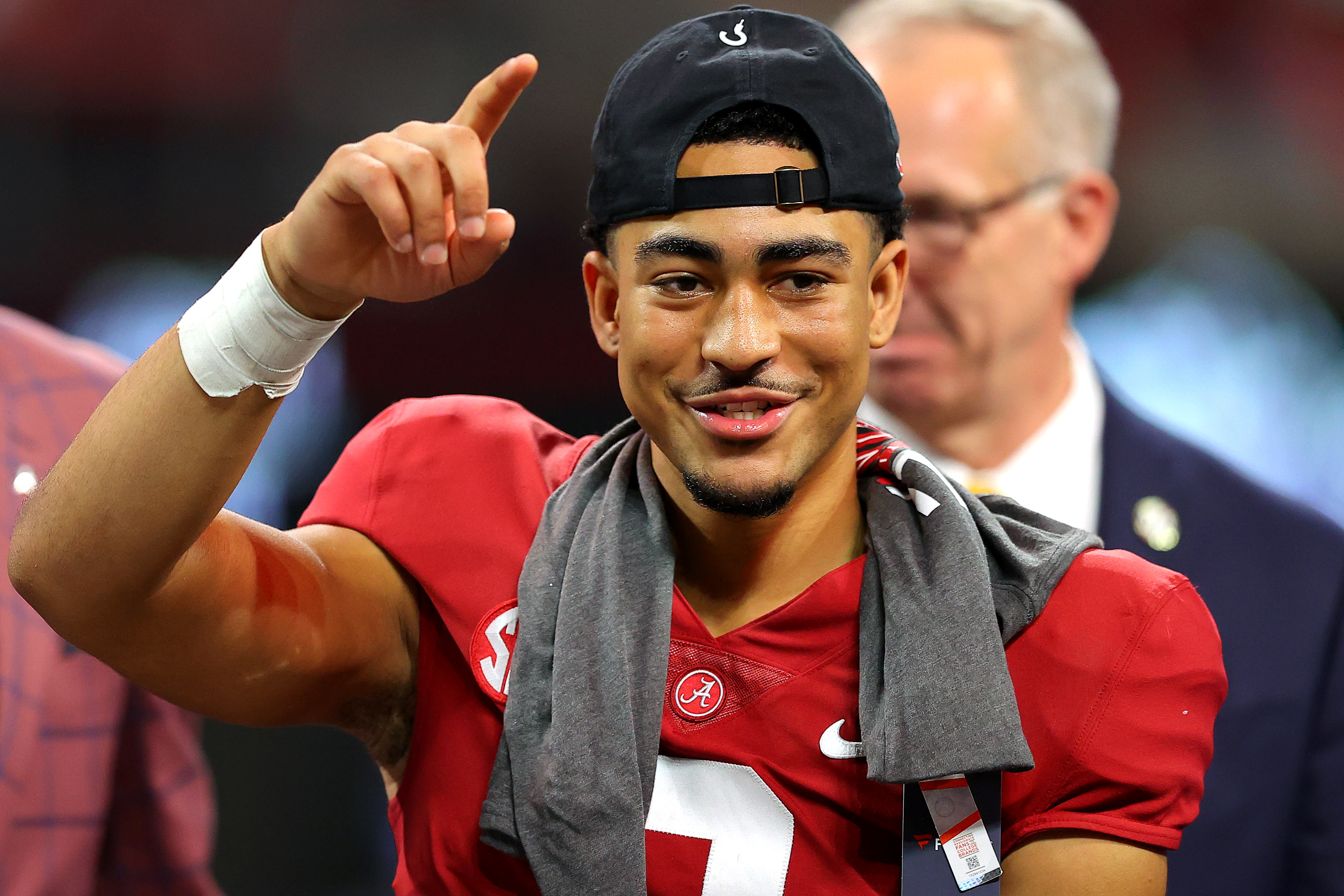 Bryce Young of the Alabama Crimson Tide celebrates the win against the Georgia Bulldogs in the SEC Championship game at Mercedes-Benz Stadium on December 04, 2021 in Atlanta, Georgia.