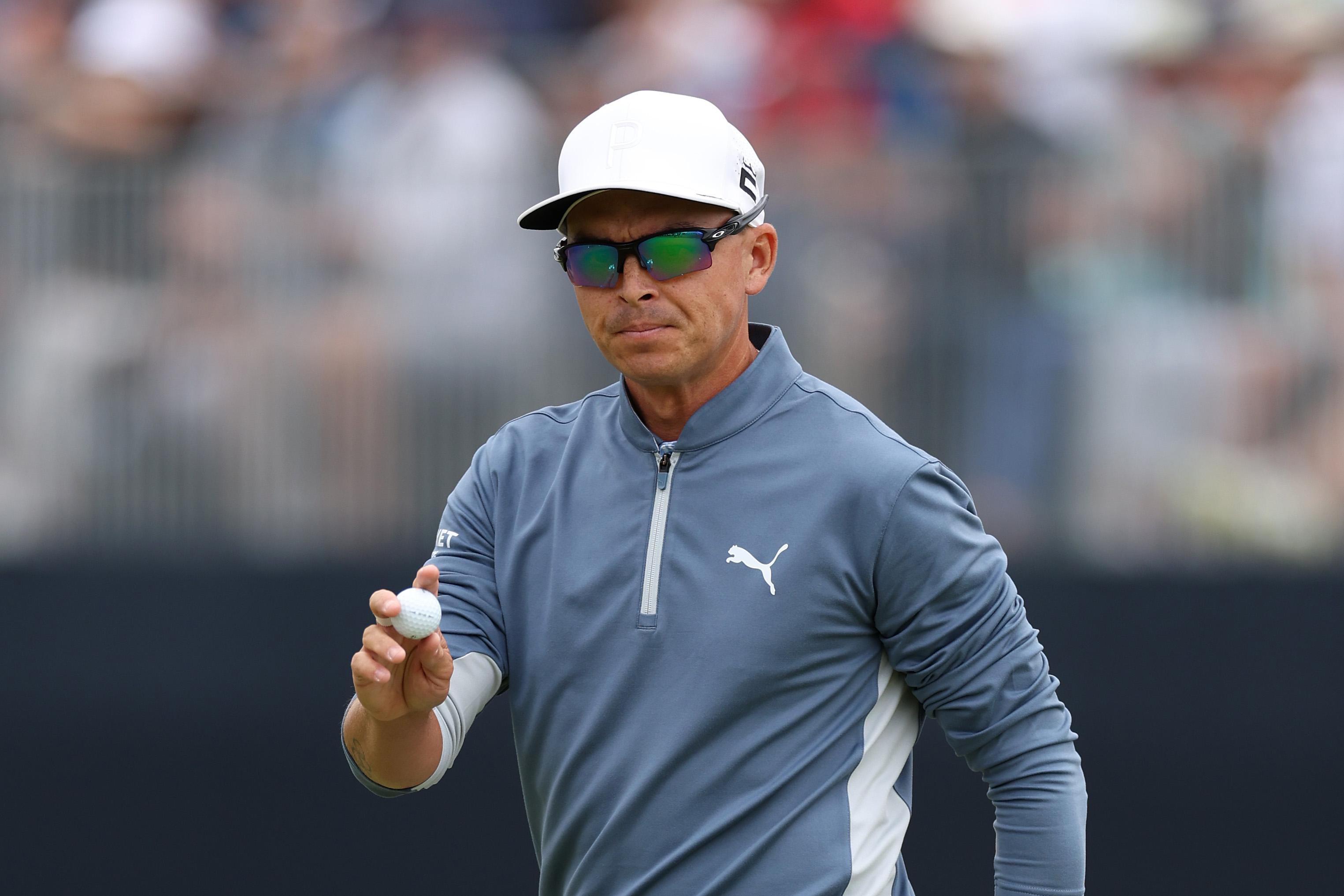 Rickie Fowler of the United States reacts to his putt on the ninth green during the first round of the 123rd U.S. Open Championship at The Los Angeles Country Club on June 15, 2023 in Los Angeles, California.