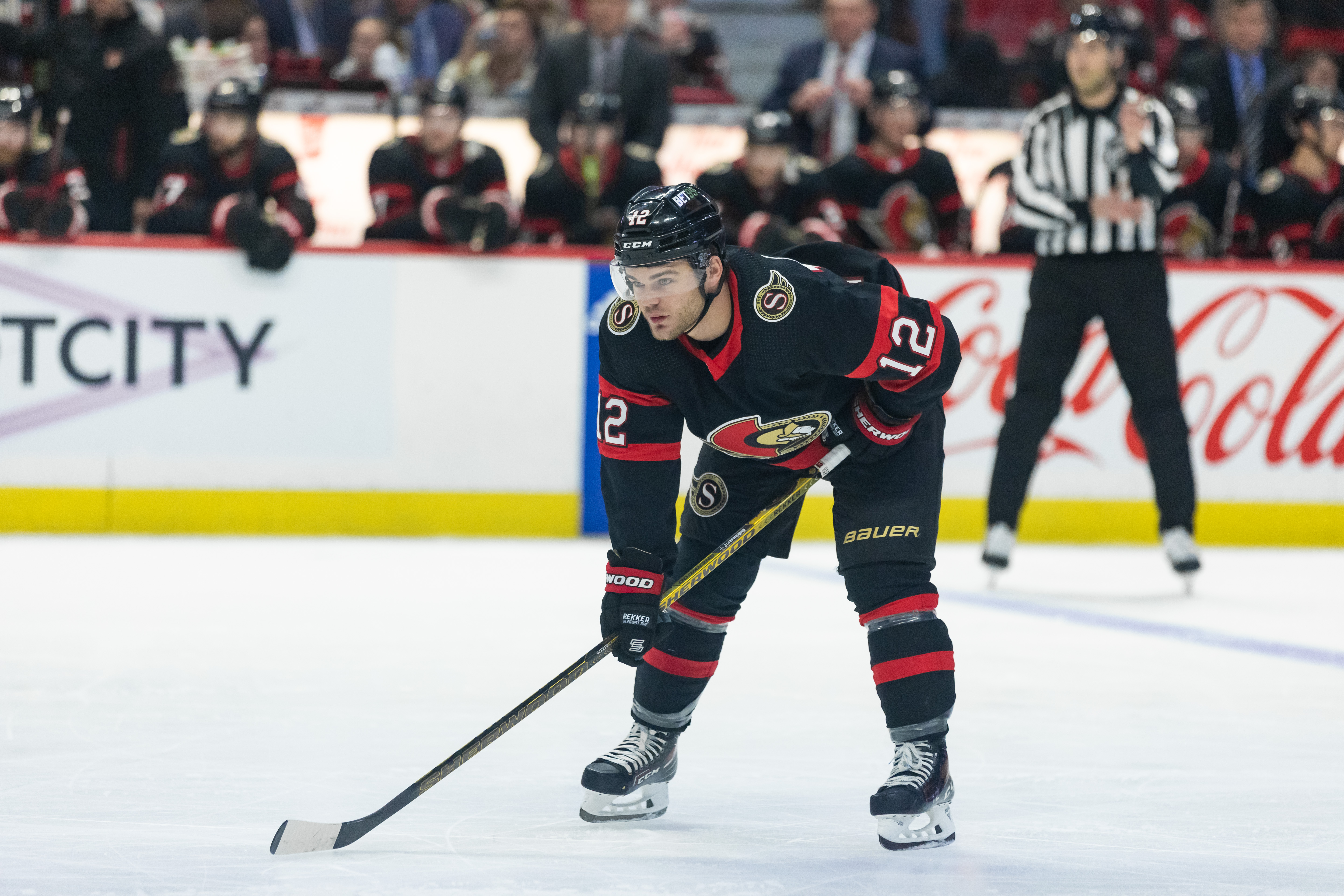 Ottawa Senators Left Wing Alex DeBrincat (12) before a face-off during second period National Hockey League action between the Carolina Hurricanes and Ottawa Senators on April 10, 2023, at Canadian Tire Centre in Ottawa, ON, Canada.