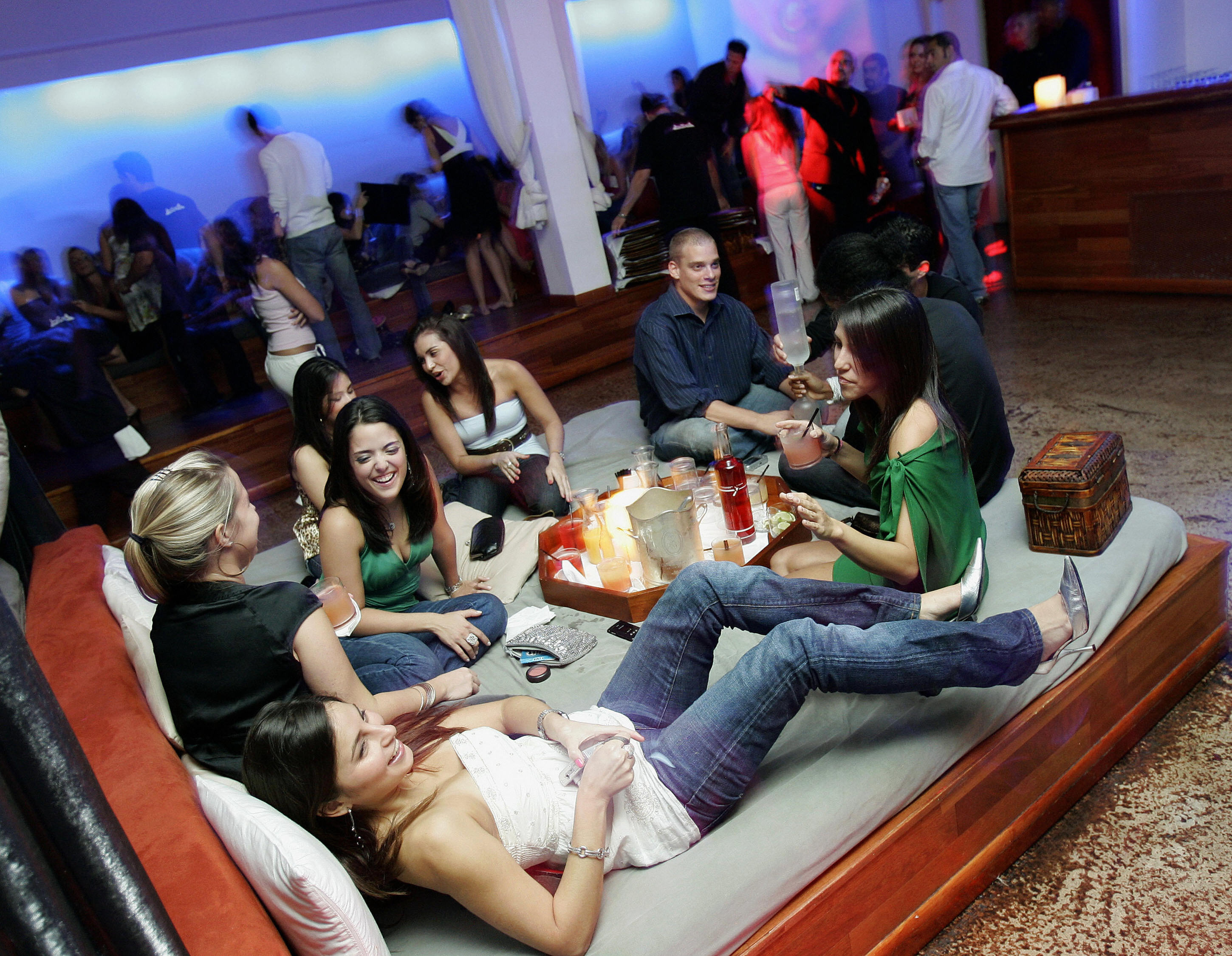 South Beach partiers lounge on over size