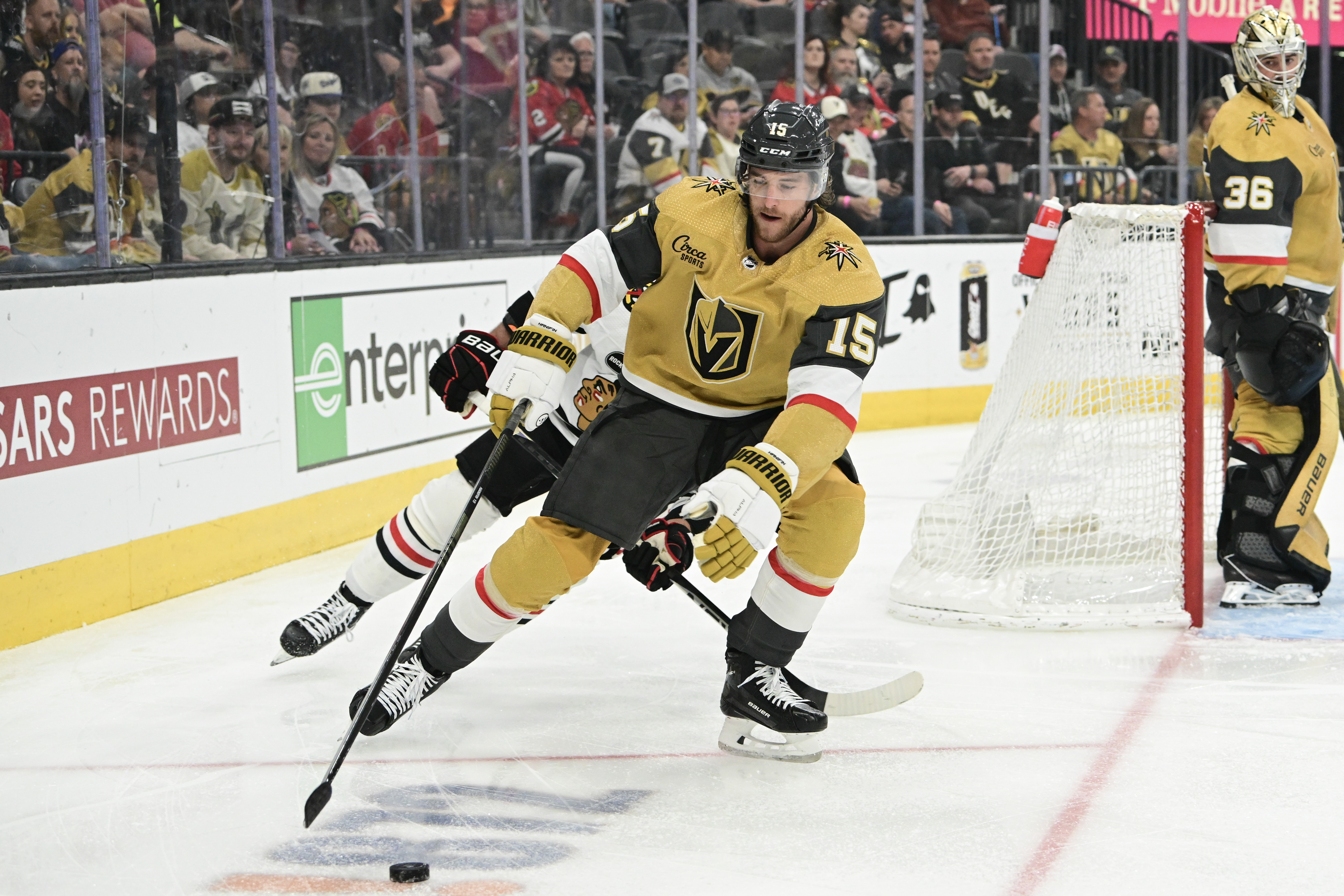 Noah Hanifin #15 of the Vegas Golden Knights skates with the puck against the Chicago Blackhawks in the first period at T-Mobile Arena on April 16, 2024 in Las Vegas, Nevada.