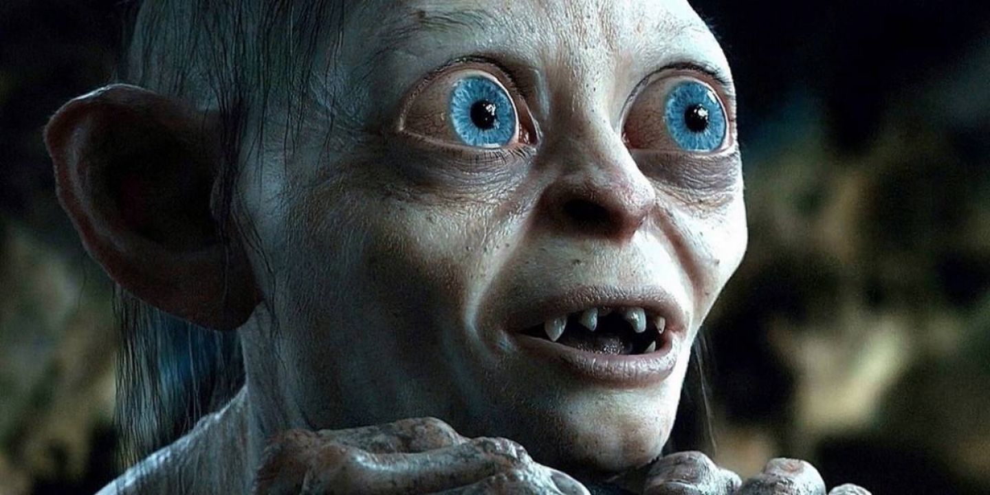 gollum smiling with big wide eyes in lord of the rings