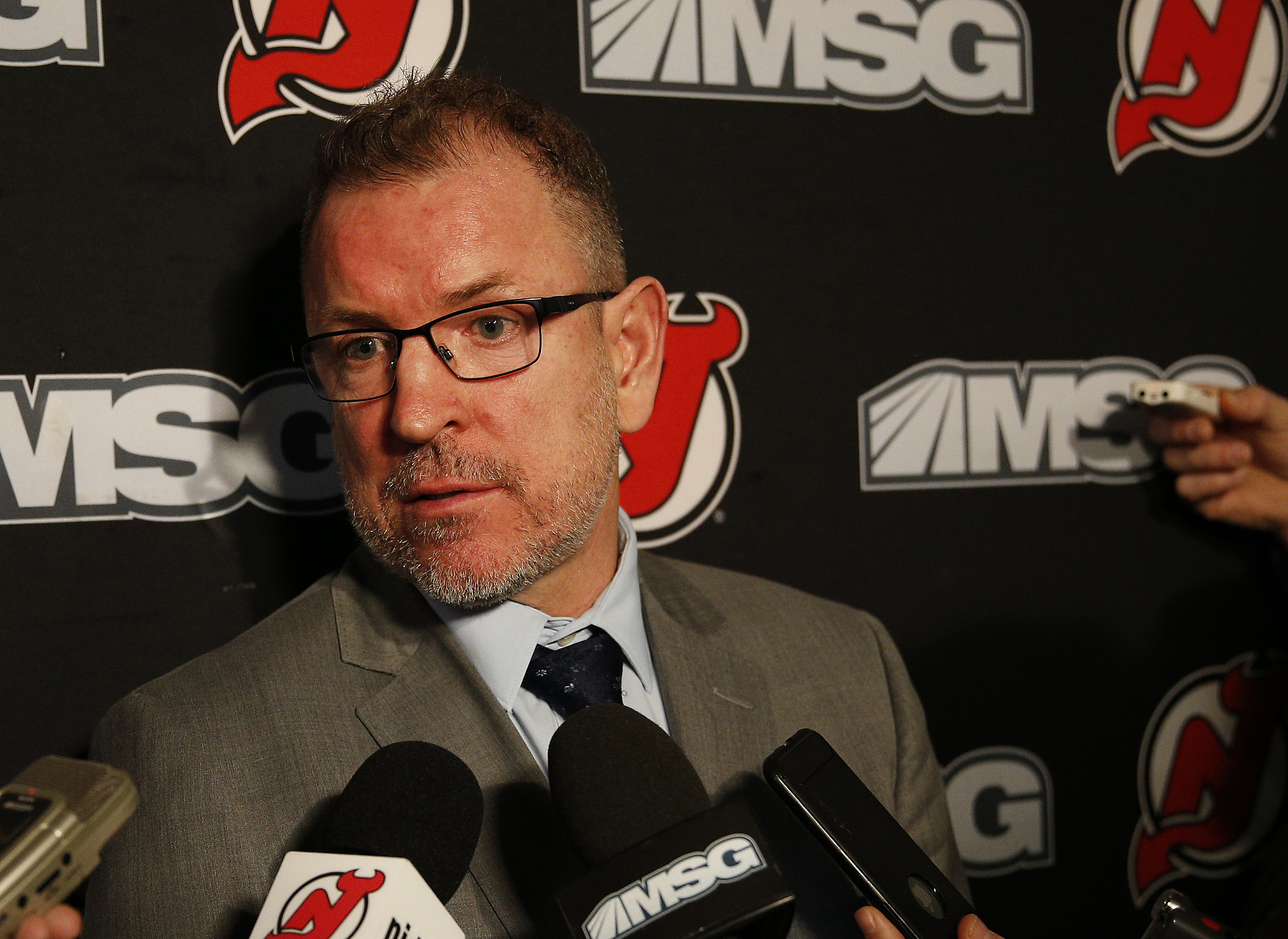 New Jersey Devils interim general manager Tom Fitzgerald addresses the media after the firing of general manager Ray Shero prior to the game against the Tampa Bay Lightning at the Prudential Center on January 12, 2020 in Newark, New Jersey.