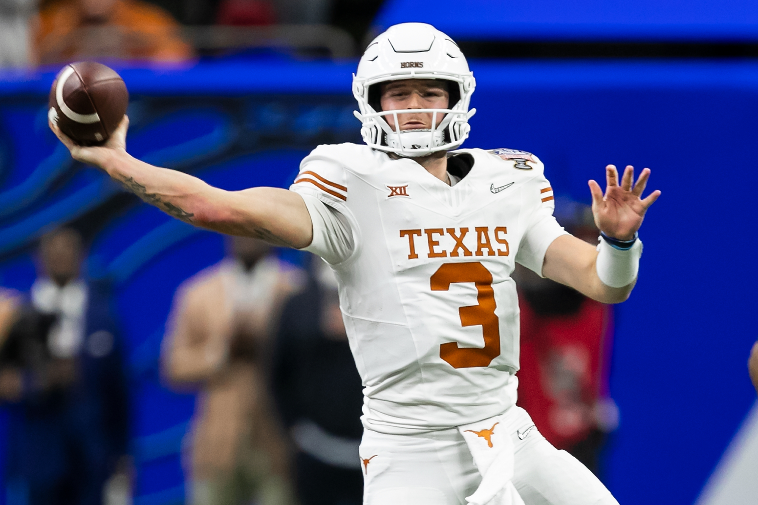 Texas quarterback Quinn Ewers (3) passes the ball during the Allstate Sugar Bowl playoff game between the Texas Longhorns and the Washington Huskies on Monday, January 1, 2024 at Caesars Superdome in New Orleans, LA.
