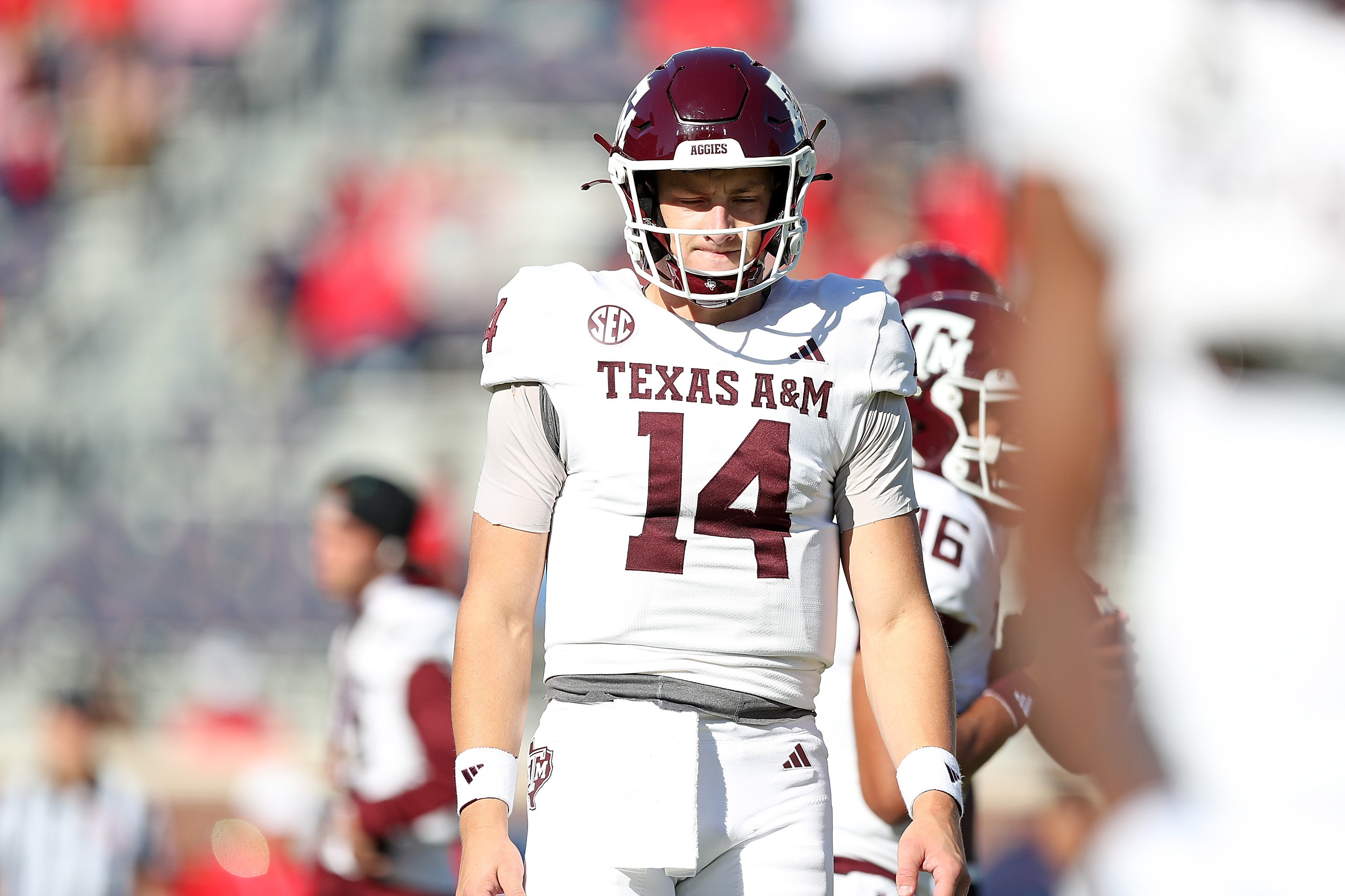 Max Johnson #14 of the Texas A&amp;M Aggies reacts during the game against the Mississippi Rebels at Vaught-Hemingway Stadium on November 04, 2023 in Oxford, Mississippi.