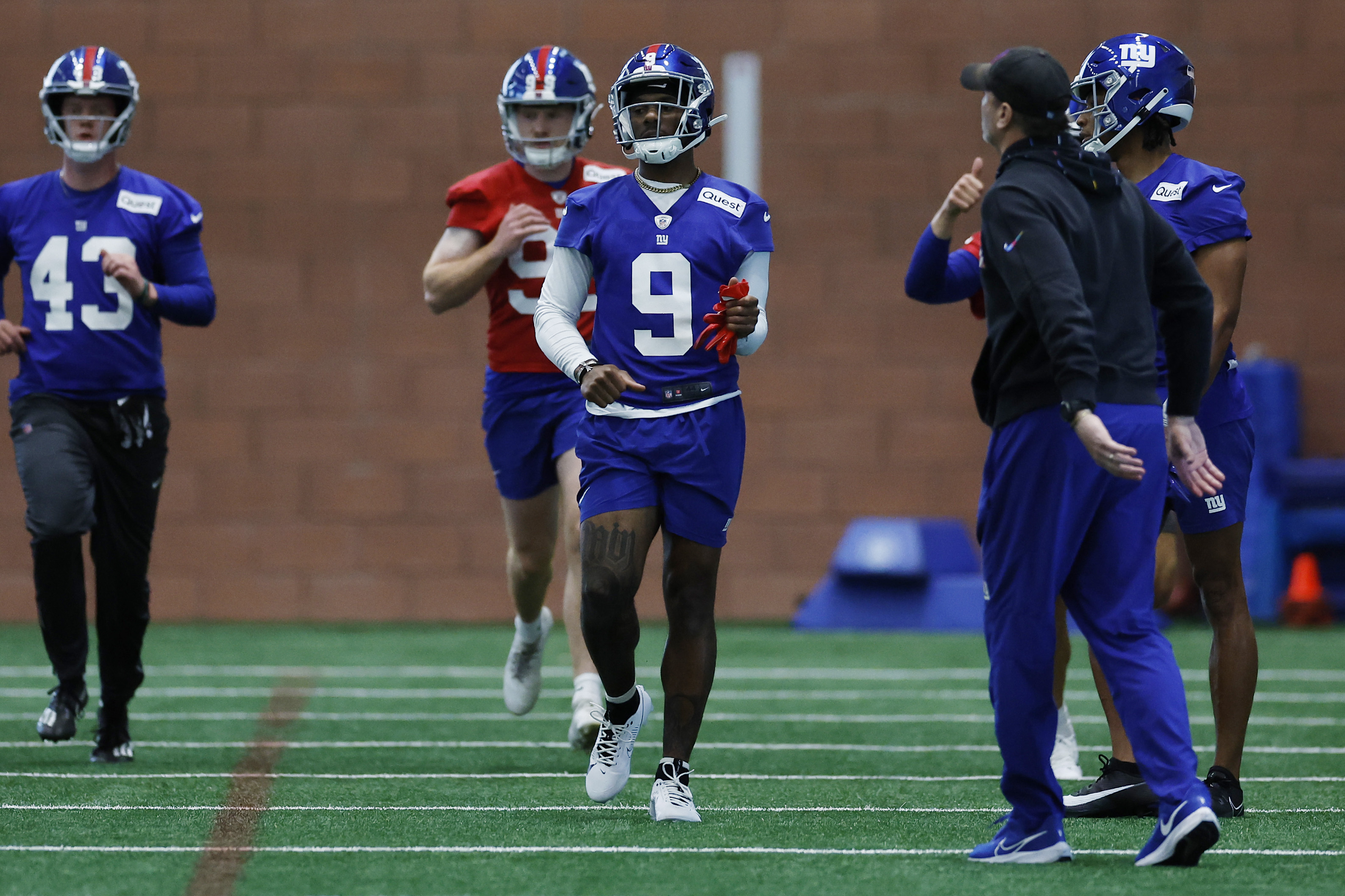 Wide receiver Malik Nabers of the New York Yankees runs drills during New York Giants Rookie Minicamp at Quest Diagnostics Training Center on May 10, 2024 in East Rutherford, New Jersey.