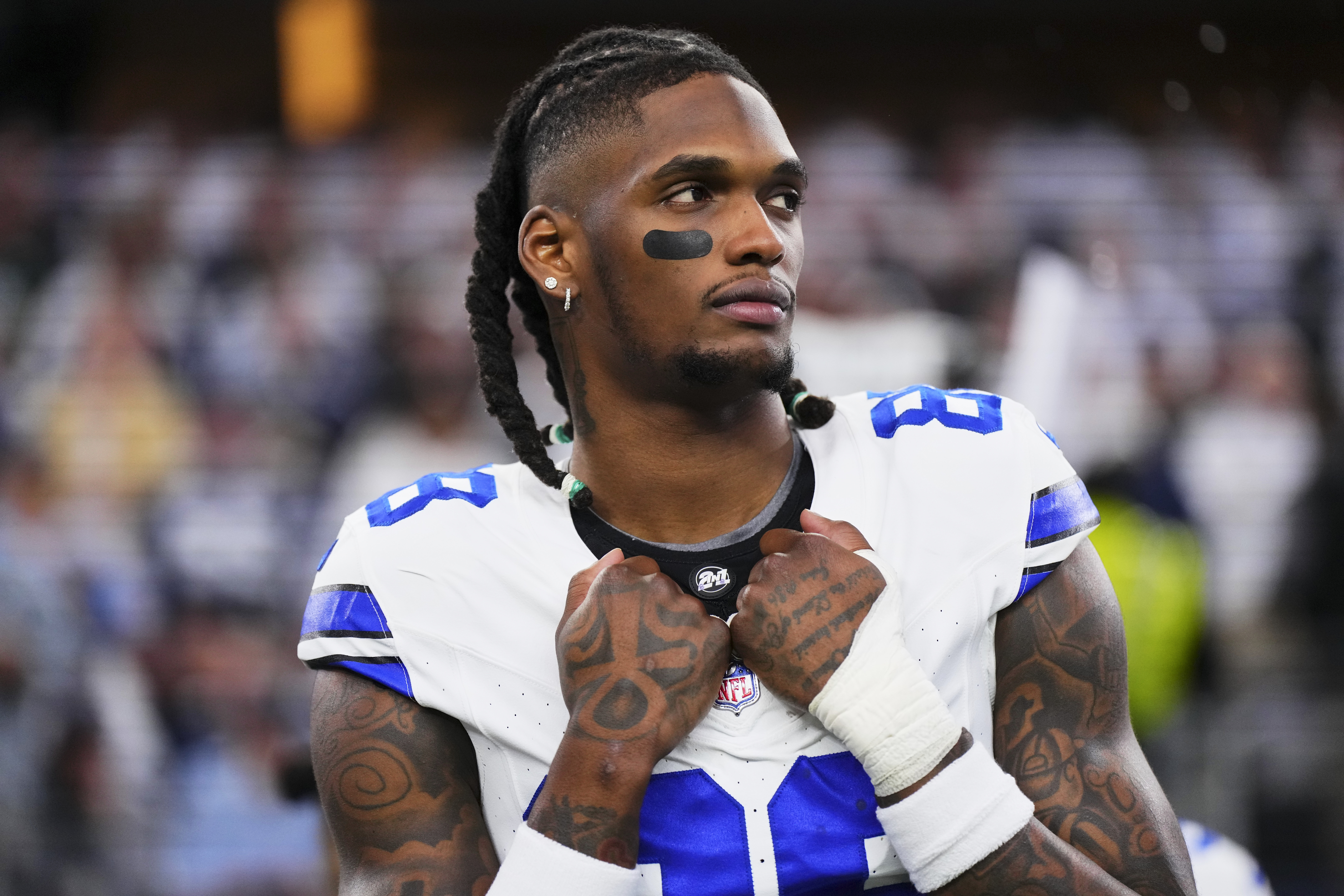 CeeDee Lamb #88 of the Dallas Cowboys looks on before kickoff against the Green Bay Packers during the NFC Wild Card playoff game at AT&amp;T Stadium on January 14, 2024 in Dallas, Texas.