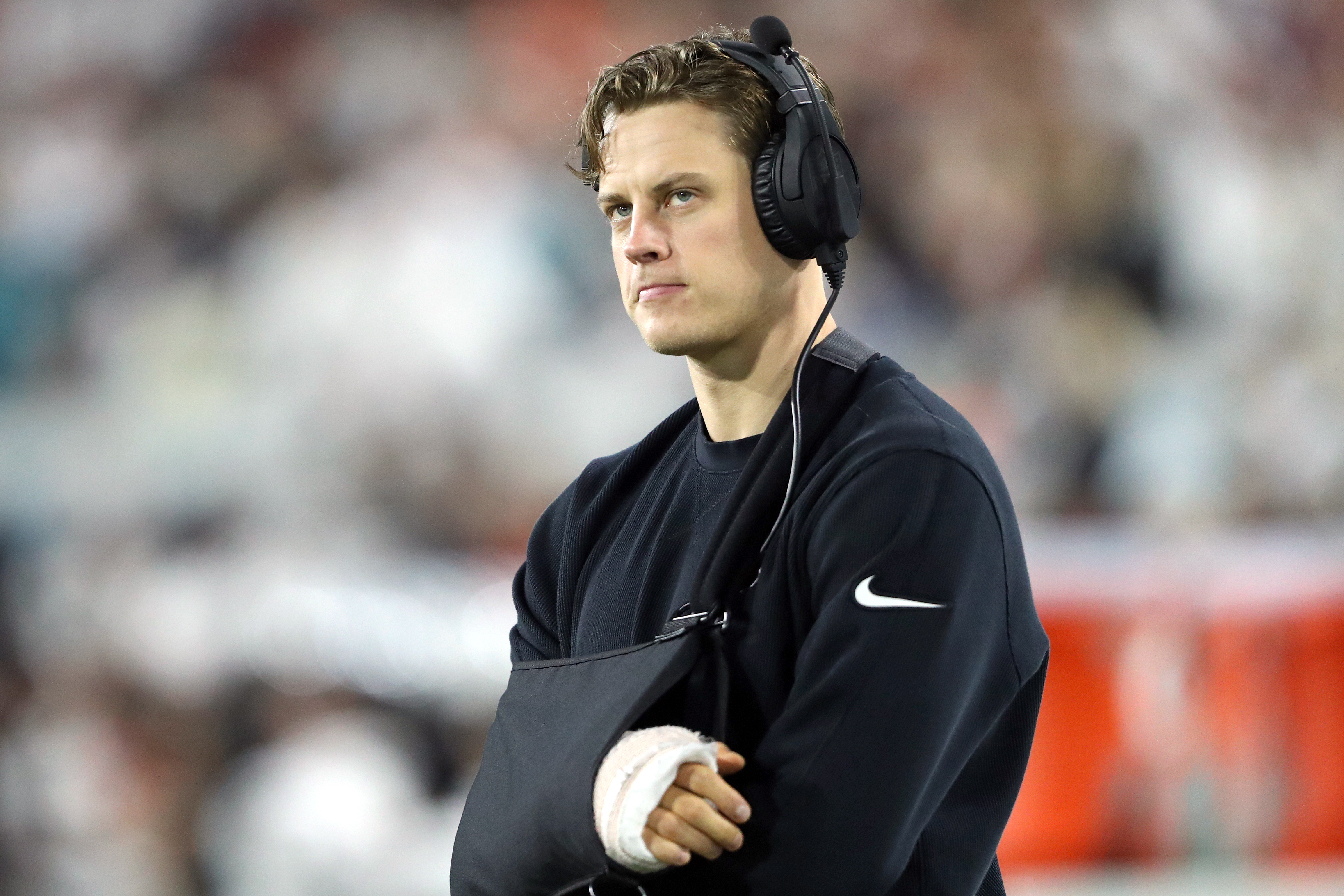 Joe Burrow #9 of the Cincinnati Bengals looks on from the sideline during the second half of a game against the Jacksonville Jaguars at EverBank Stadium on December 04, 2023 in Jacksonville, Florida.