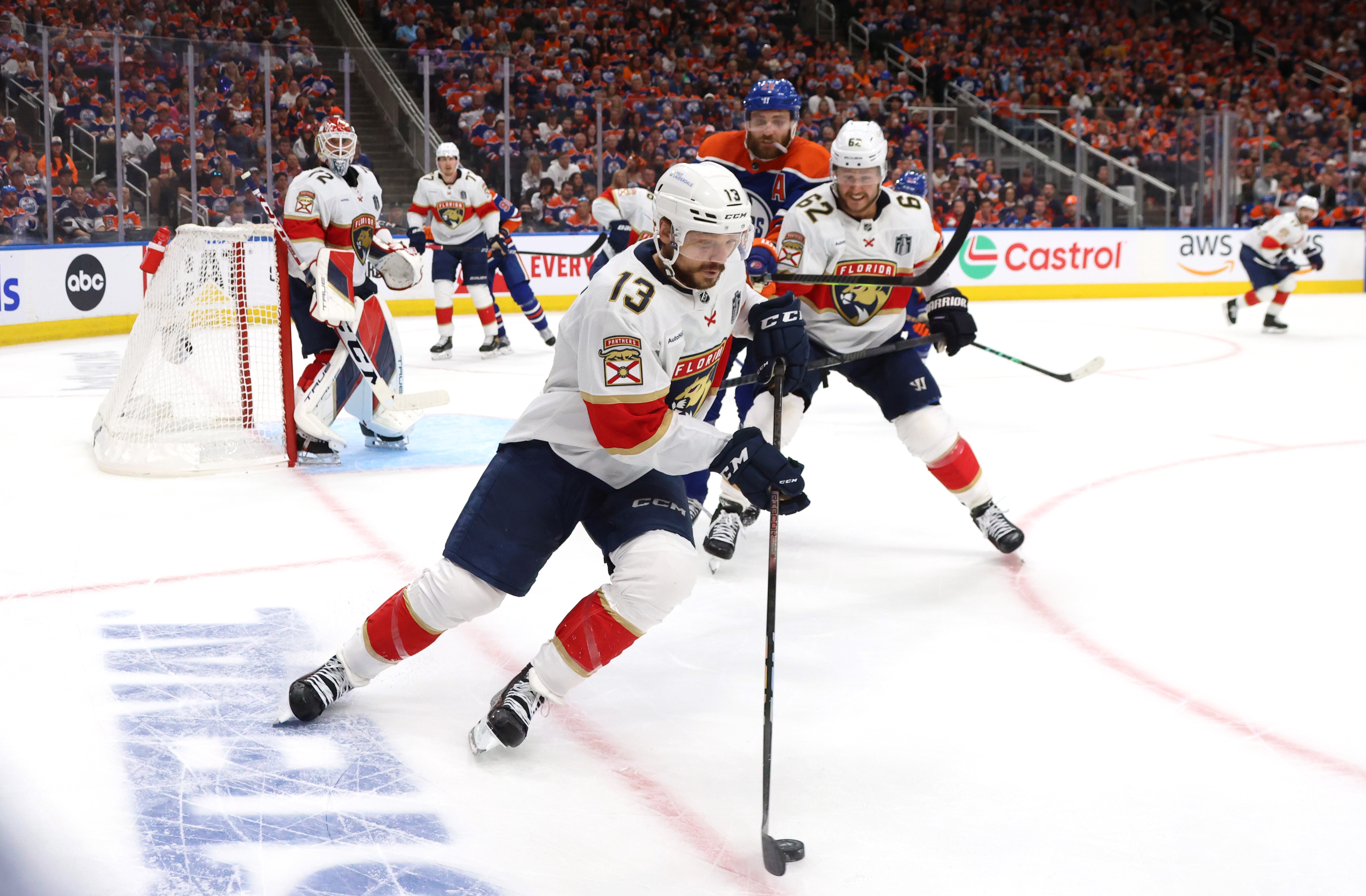 Sam Reinhart of the Florida Panthers controls the puck in the corner during the second period of Game Three of the 2024 Stanley Cup Final between the Florida Panthers and the Edmonton Oilers at Rogers Place on June 13, 2024 in Edmonton, Alberta.