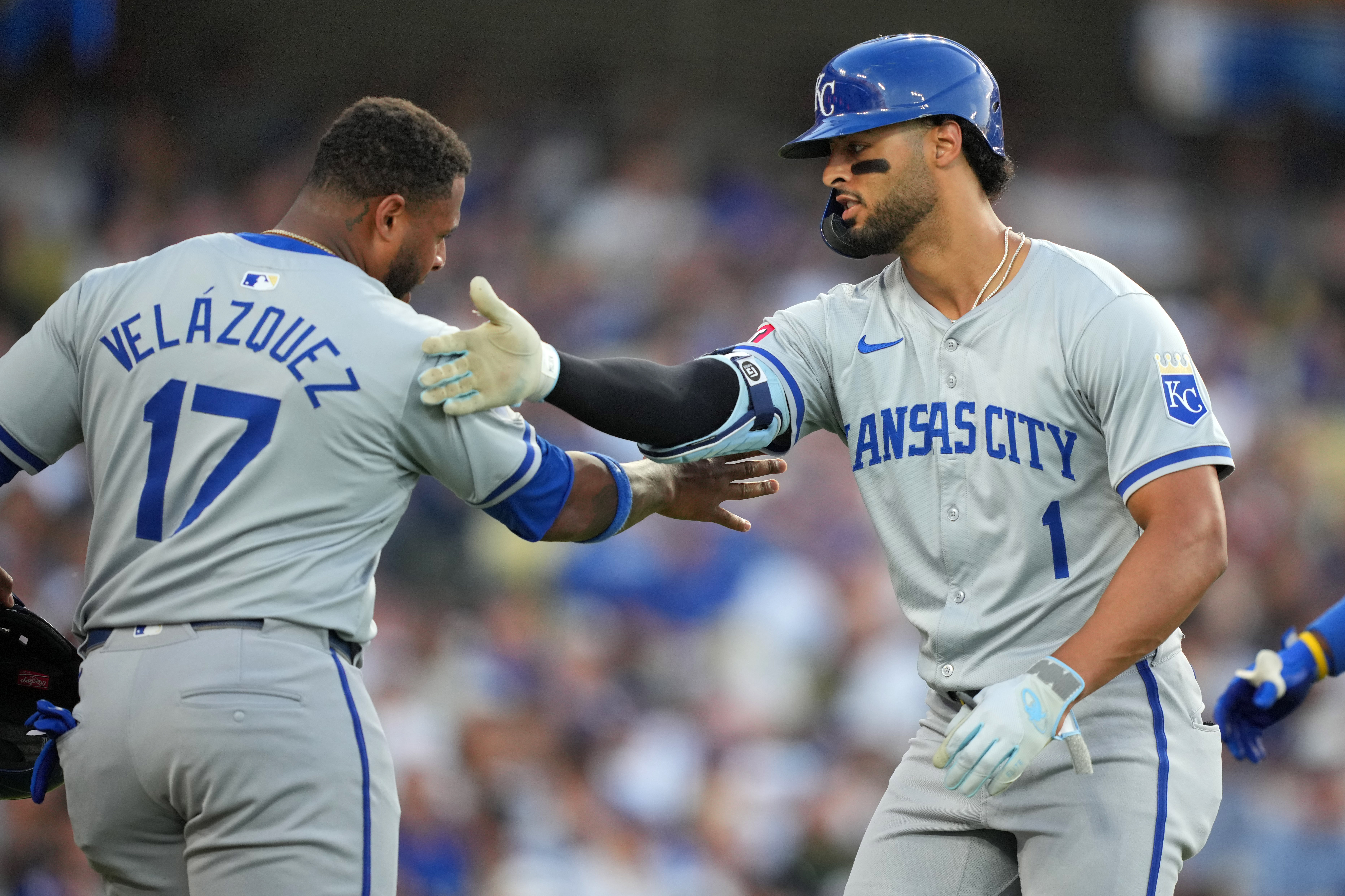 Kansas City Royals left fielder MJ Melendez (1) celebrates with designated hitter Nelson Velazquez (17) after hitting a grand slam home run in the sixth inning against the Los Angeles Dodgers at Dodger Stadium.