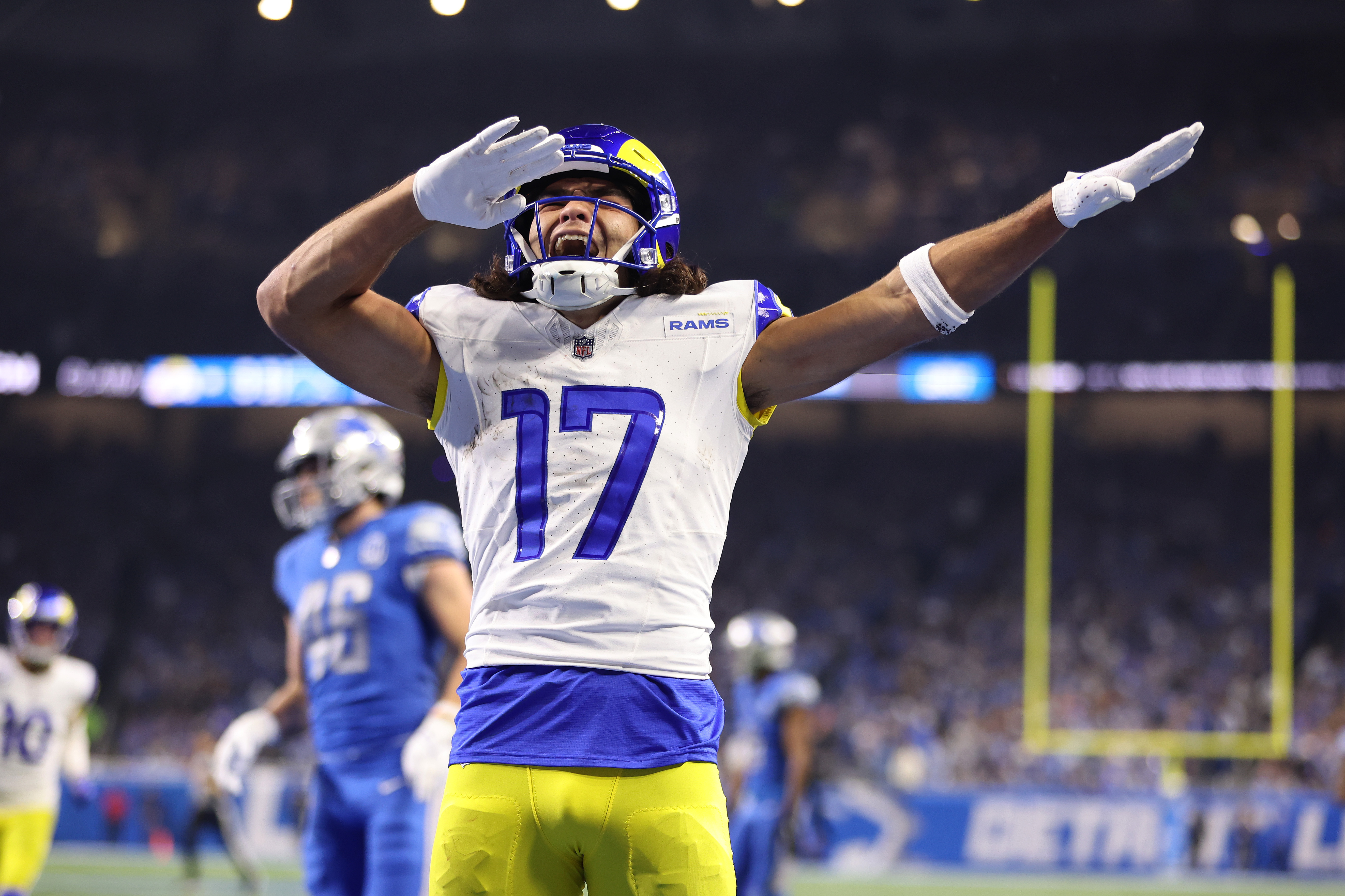 Puka Nacua #17 of the Los Angeles Rams reacts to a touchdown while playing the Detroit Lions during a NFC Wild Card Playoff game at Ford Field on January 14, 2024 in Detroit, Michigan.