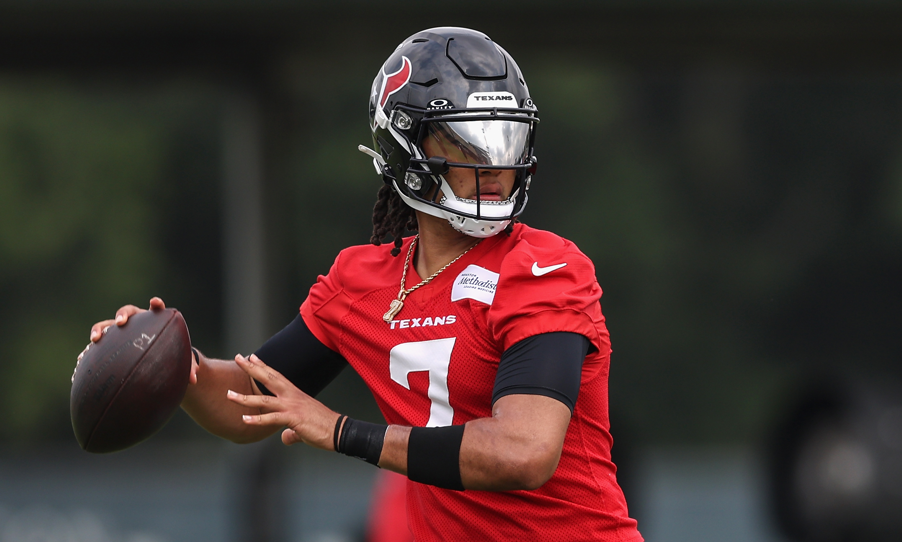 C.J. Stroud #7 of the Houston Texans looks to pass during Mandatory Minicamp at Houston Methodist Training Center on June 04, 2024 in Houston, Texas.